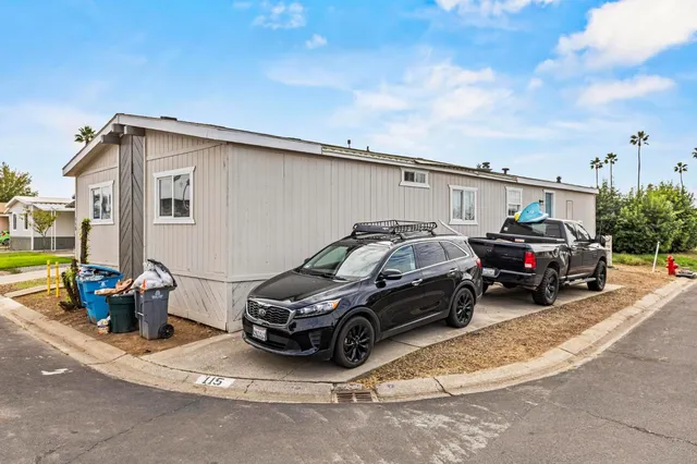 a view of a car in front of house