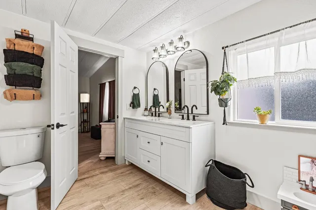 a view of a bathroom sink and a mirror
