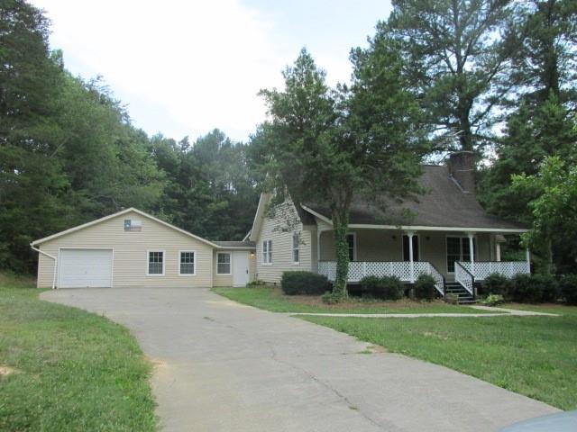 236 East Valley Road Northeast Rydal, GA 30171 - Photo 1 of 1 a view of house with yard and green space