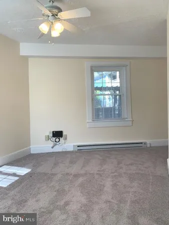 en view of an empty room with a window