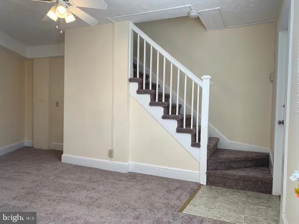 a view of an entryway with staircase