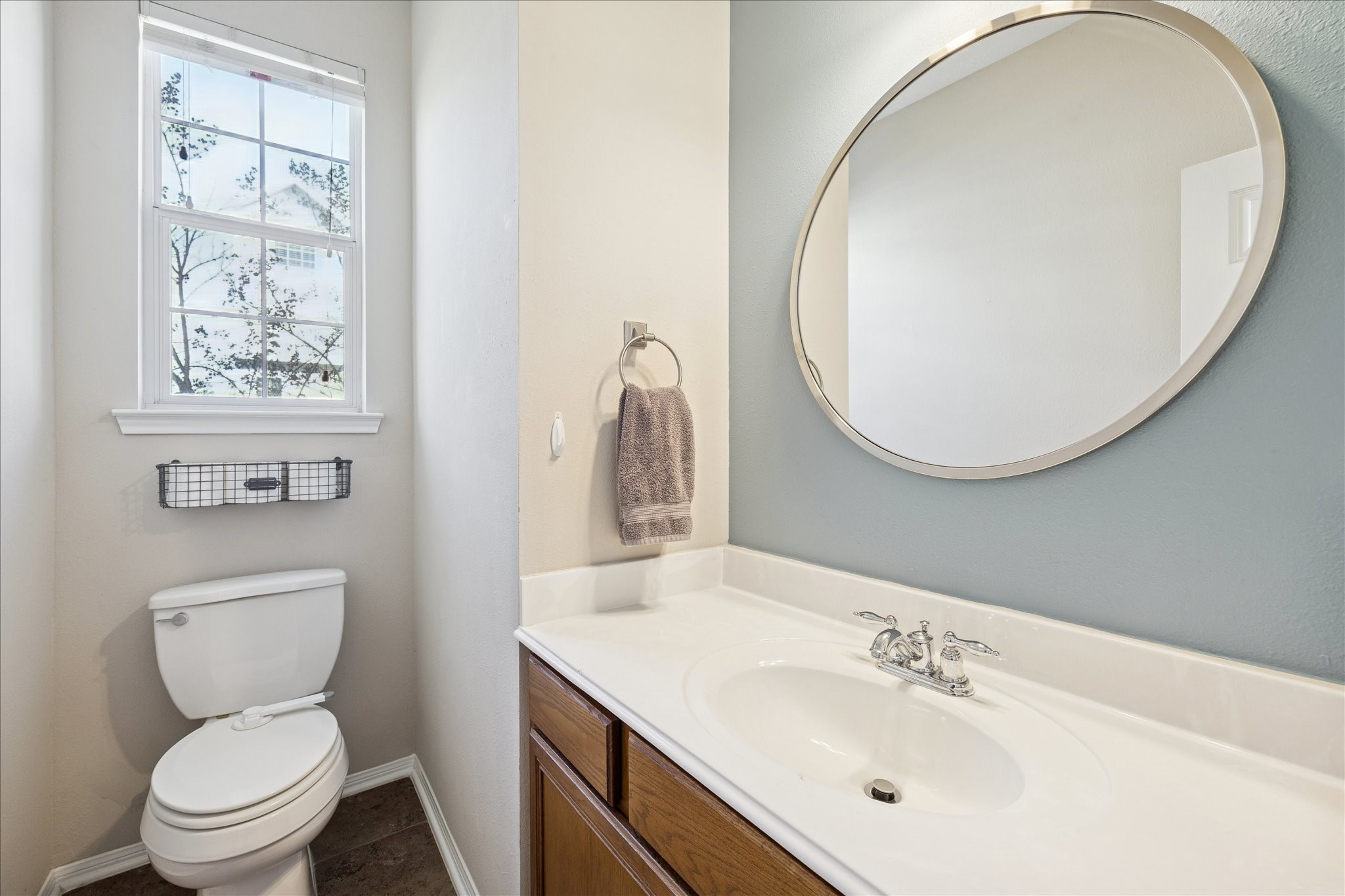 3332 Masters Point Drive Houston, TX 77091 - Photo 14 of 21 a bathroom with a toilet sink and mirror