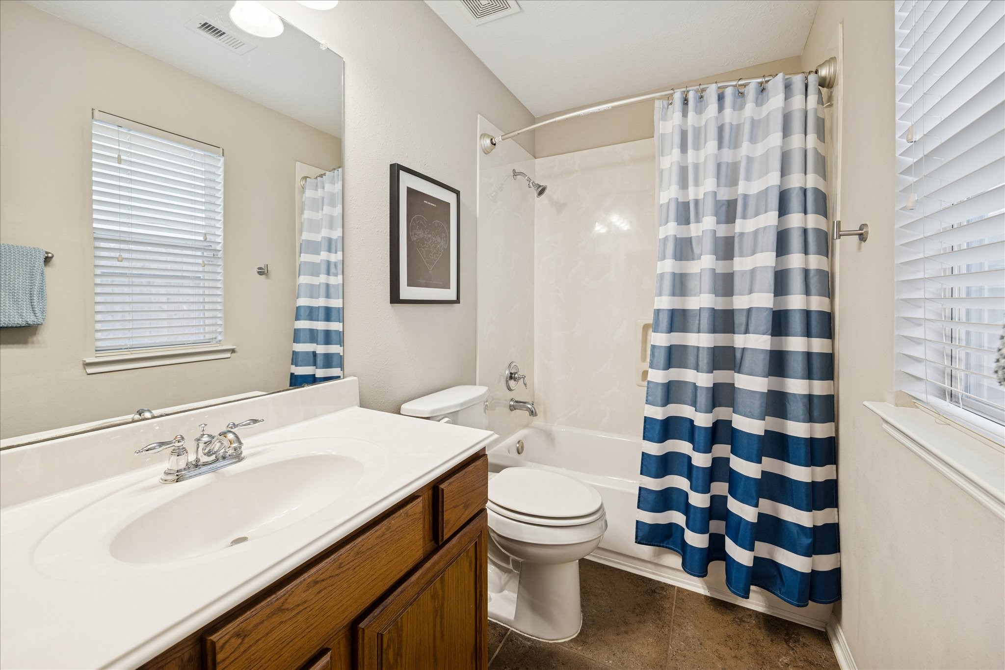 3332 Masters Point Drive Houston, TX 77091 - Photo 18 of 21 a bathroom with a sink toilet and shower