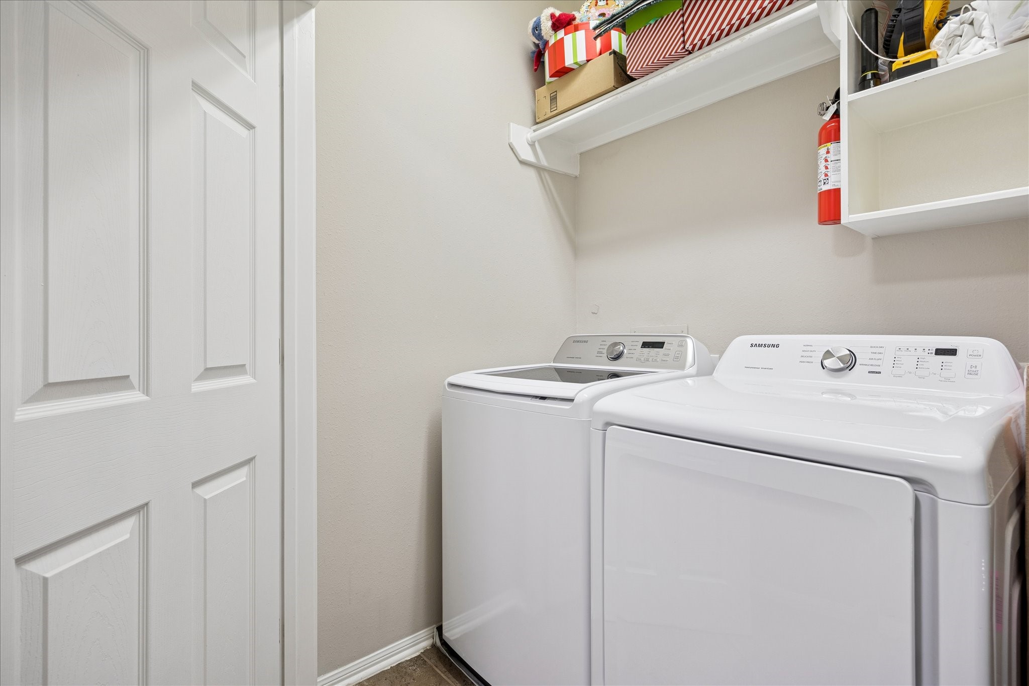 3332 Masters Point Drive Houston, TX 77091 - Photo 19 of 21 a utility room with dryer and washer