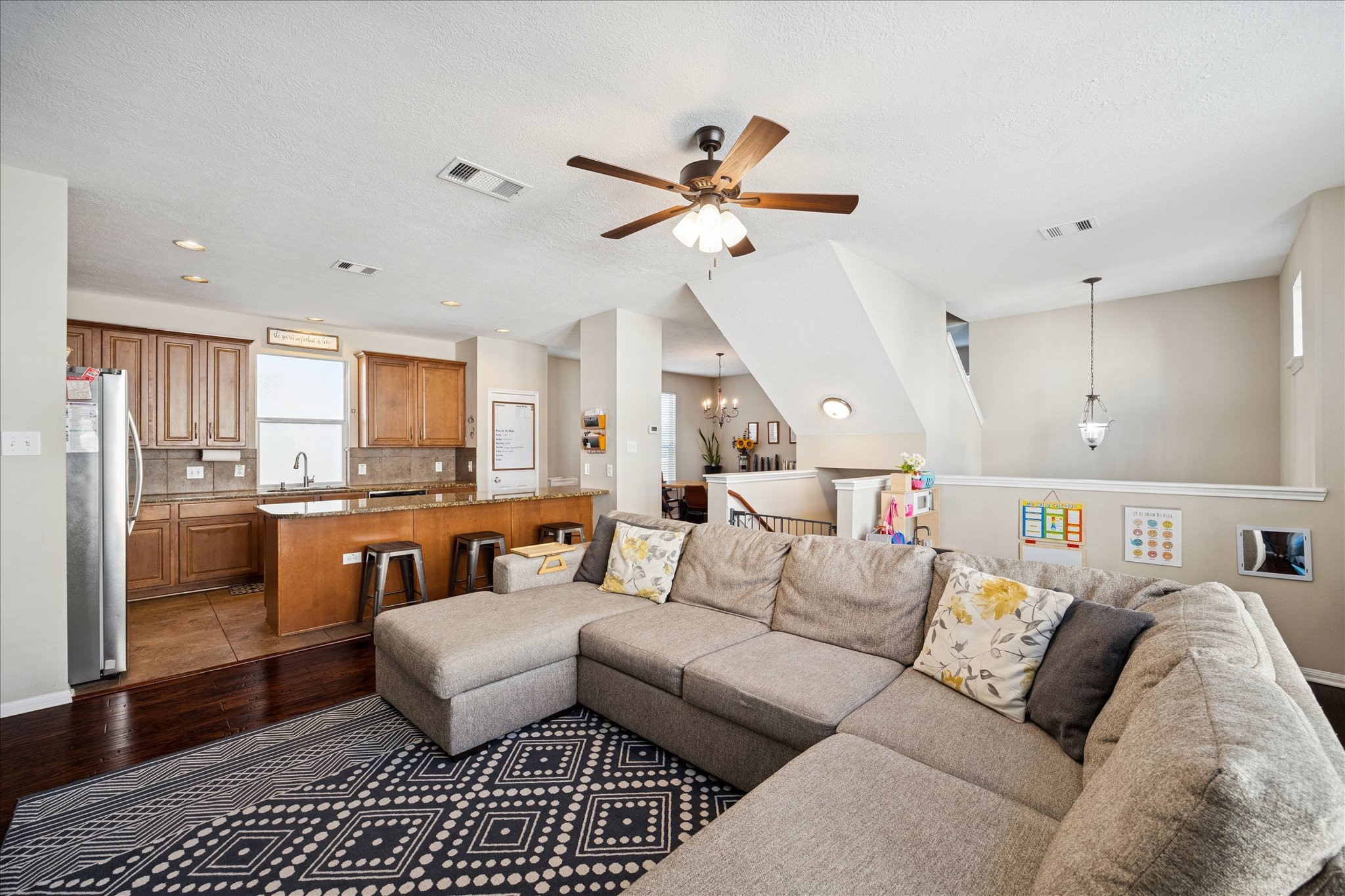 3332 Masters Point Drive Houston, TX 77091 - Photo 2 of 21 a living room with furniture and kitchen view
