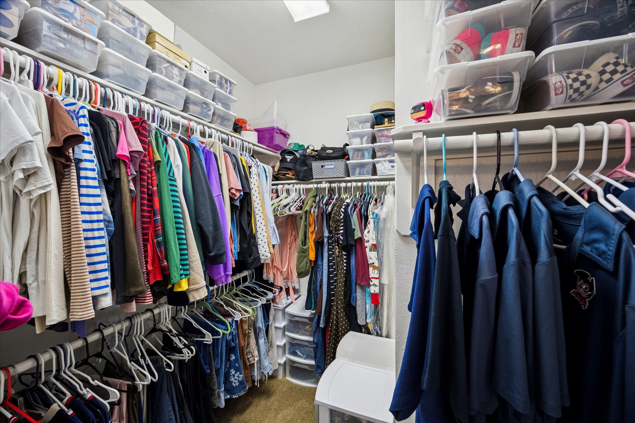 3332 Masters Point Drive Houston, TX 77091 - Photo 7 of 21 a view of walk in closet with clothes
