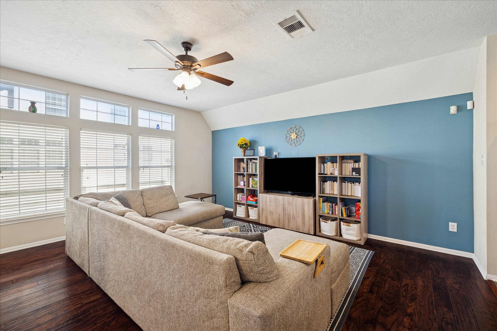 3332 Masters Point Drive Houston, TX 77091 - Photo 10 of 21 a living room with furniture and a flat screen tv