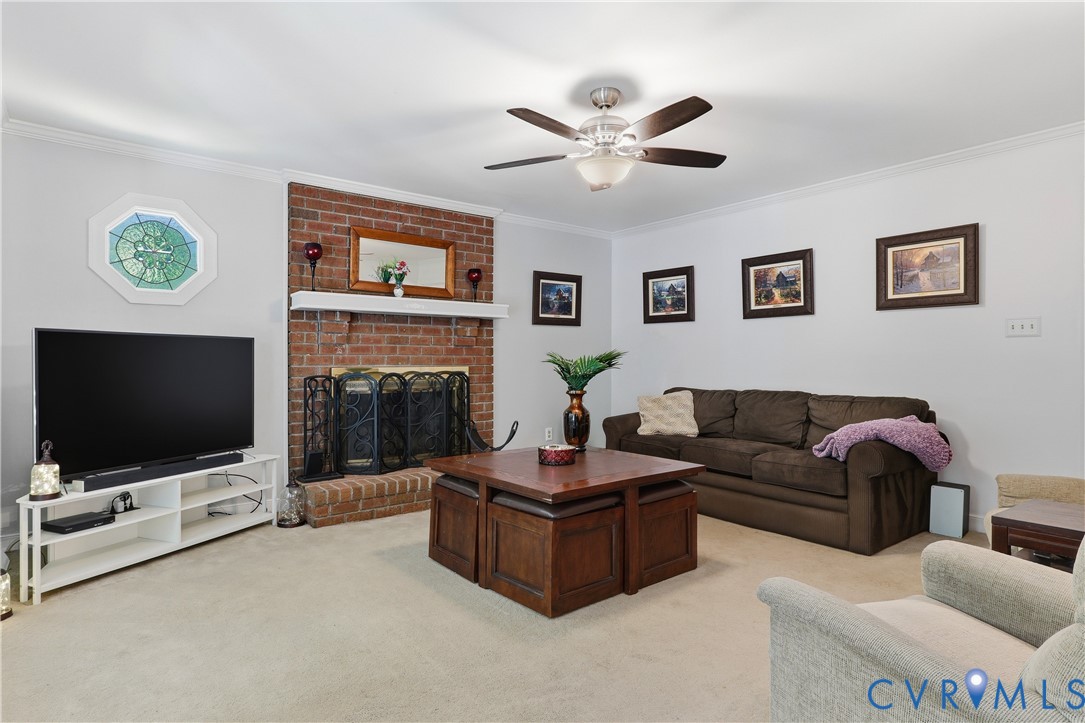 12512 2nd Branch Road Chesterfield, VA 23838 - Photo 10 of 56 a living room with furniture and a flat screen tv