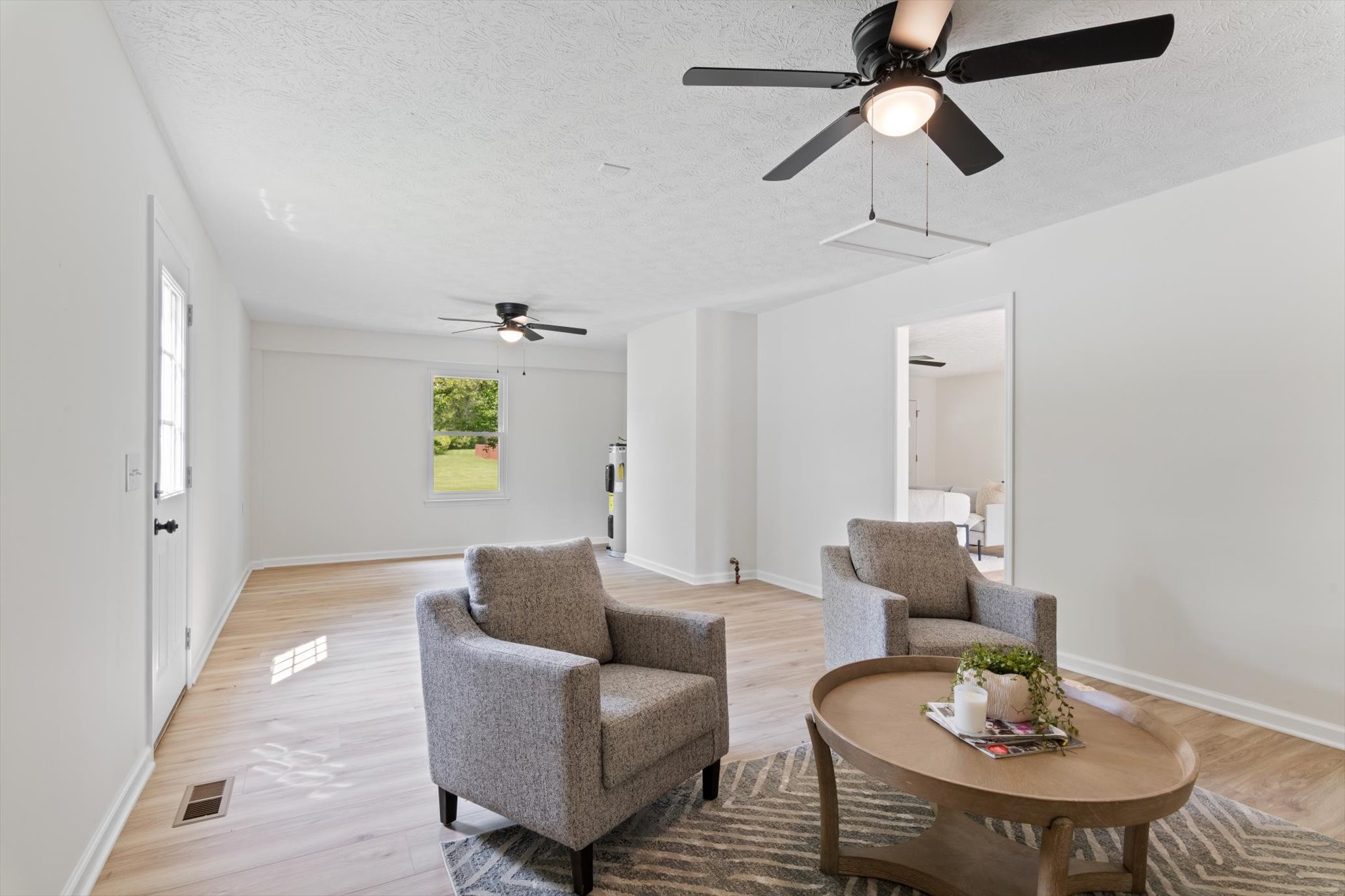3671 Apache Trail Springfield, TN 37172 - Photo 19 of 28 a living room with furniture and a wooden floor