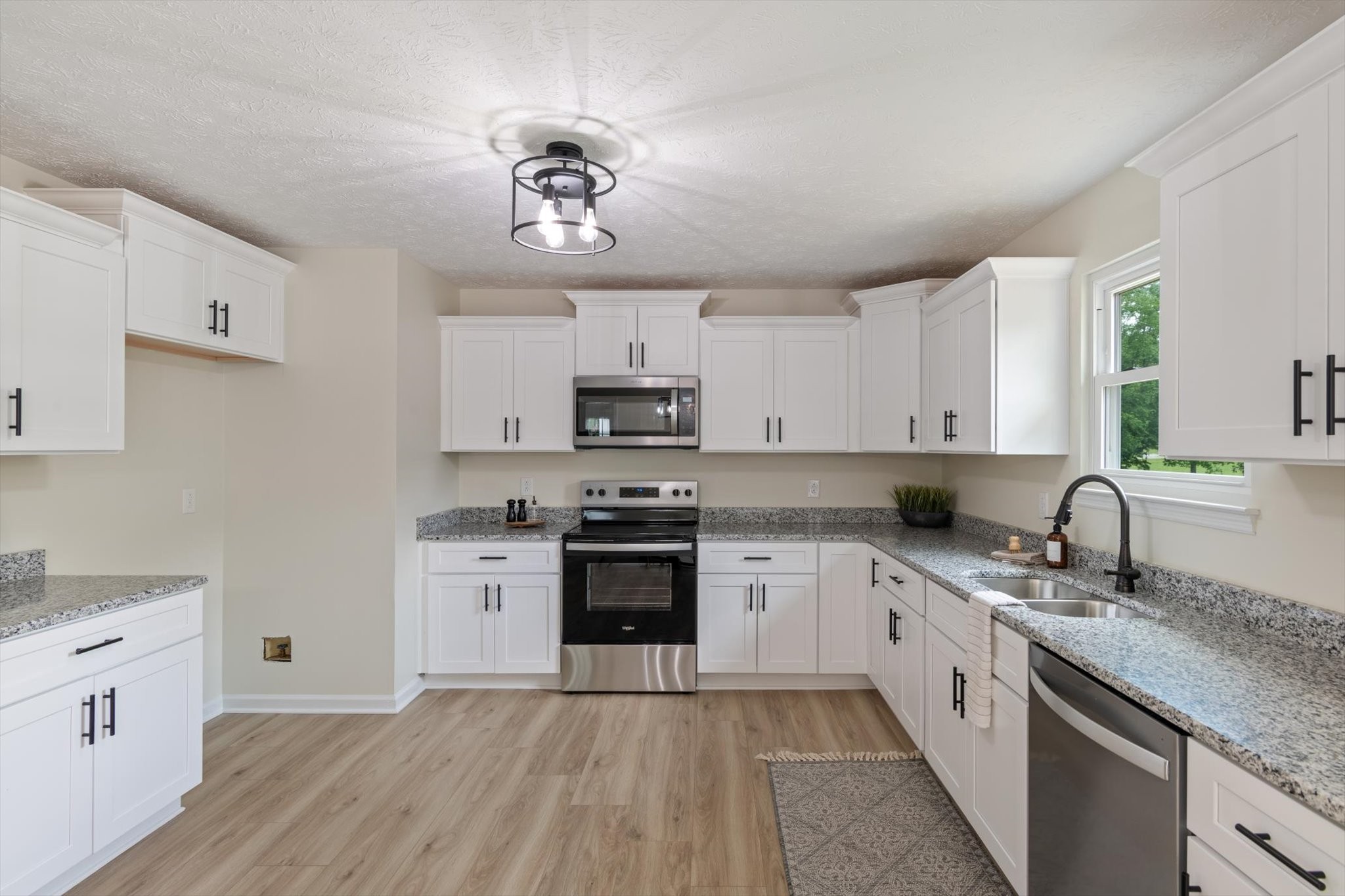 3671 Apache Trail Springfield, TN 37172 - Photo 9 of 28 a kitchen with a sink stove and cabinets