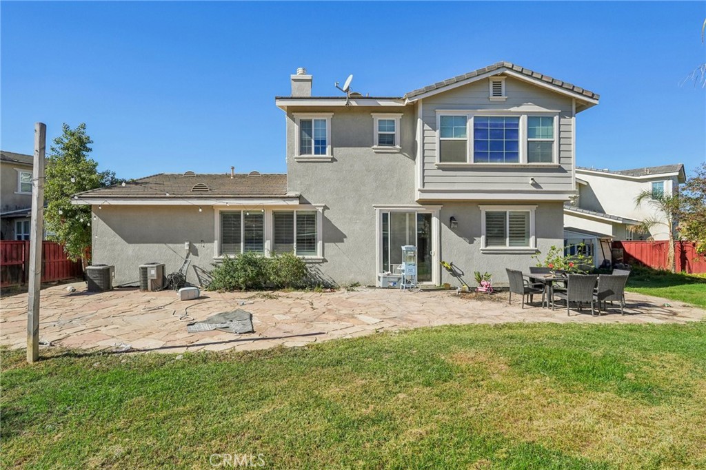 264 CLEOMELLA Court Hemet, CA 92543 - Photo 19 of 31 a front view of a house with a yard