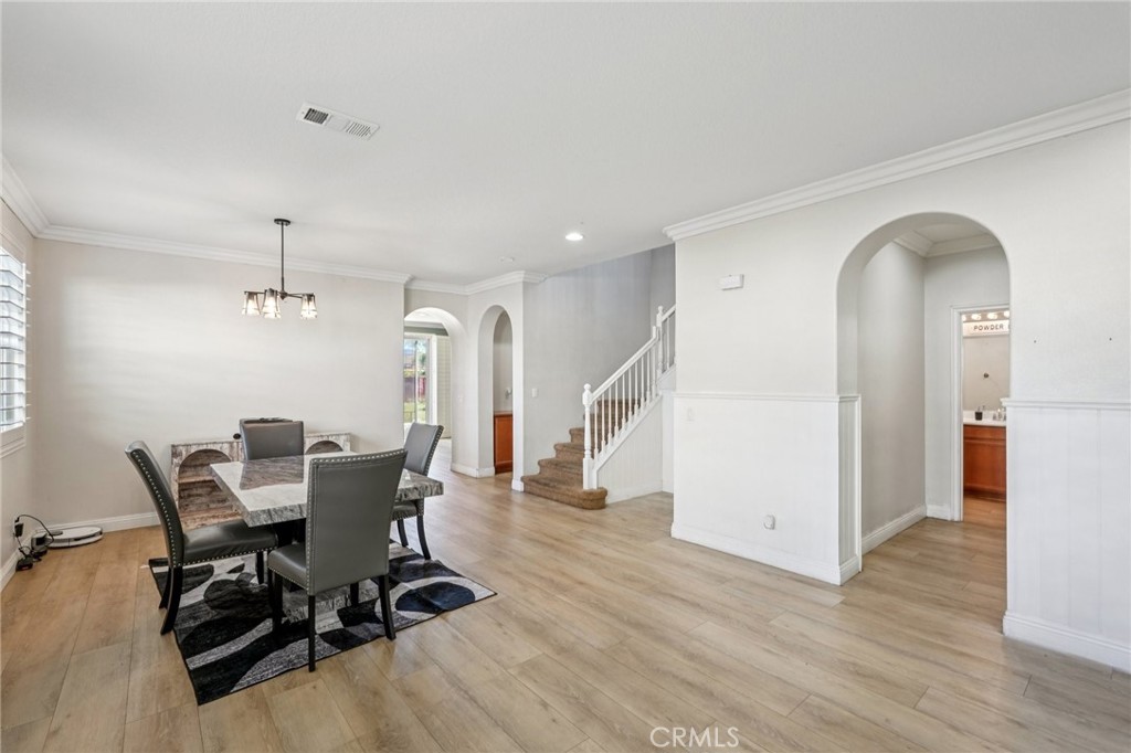 264 CLEOMELLA Court Hemet, CA 92543 - Photo 2 of 31 a view of a workspace with furniture and wooden floor