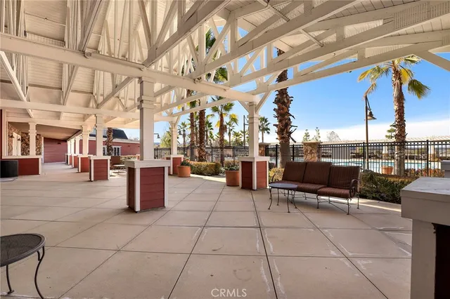 a outdoor space with lots of tables and chairs