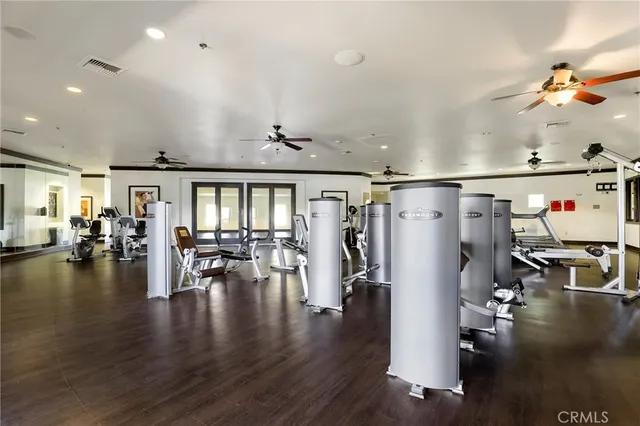 a view of a room with lots of dining room and wooden floor