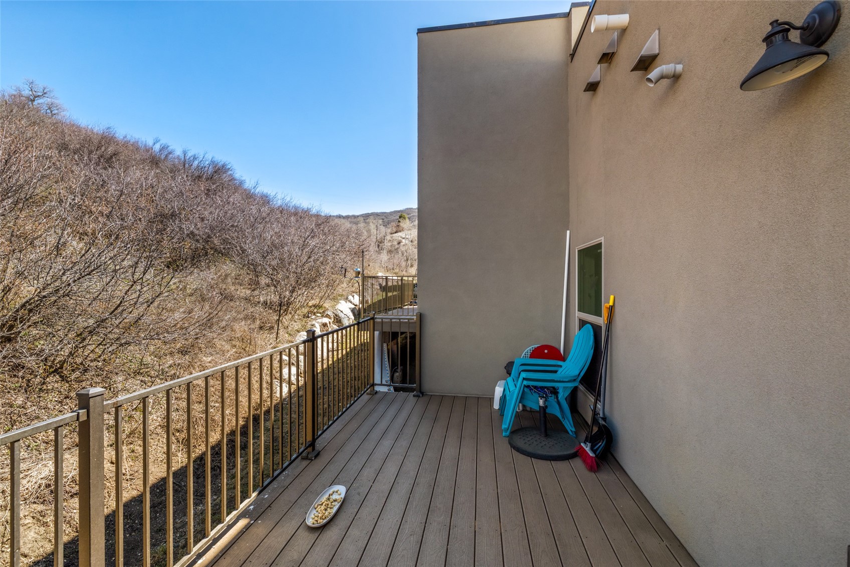 1680 Copper Ridge Drive, Unit 101 Steamboat Springs, CO 80487 - Photo 18 of 21 a view of a balcony with furniture and wooden floor