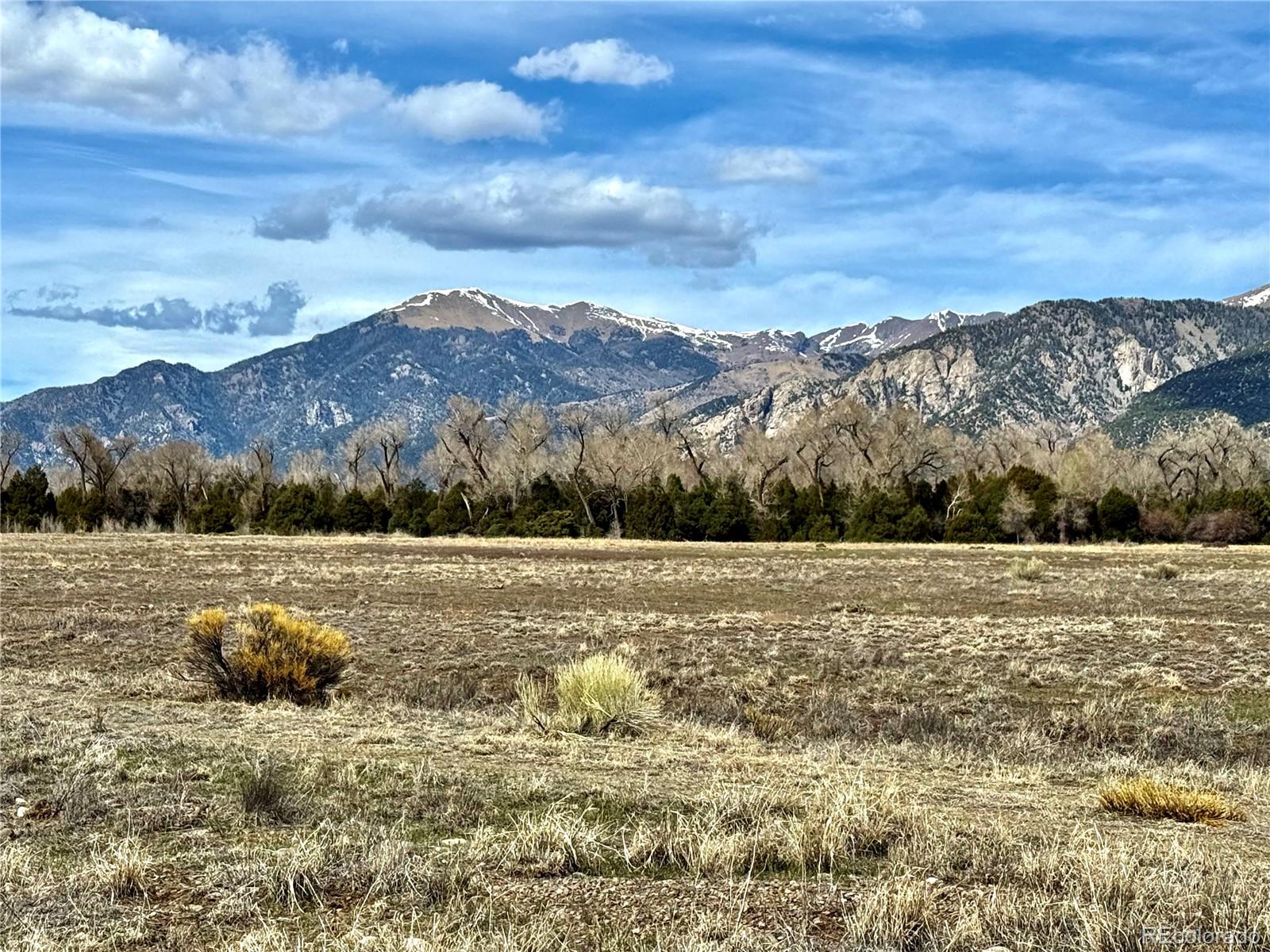 915 Brook Trout Road Crestone, CO 81131 - Photo 1 of 6 a view of lake with mountain