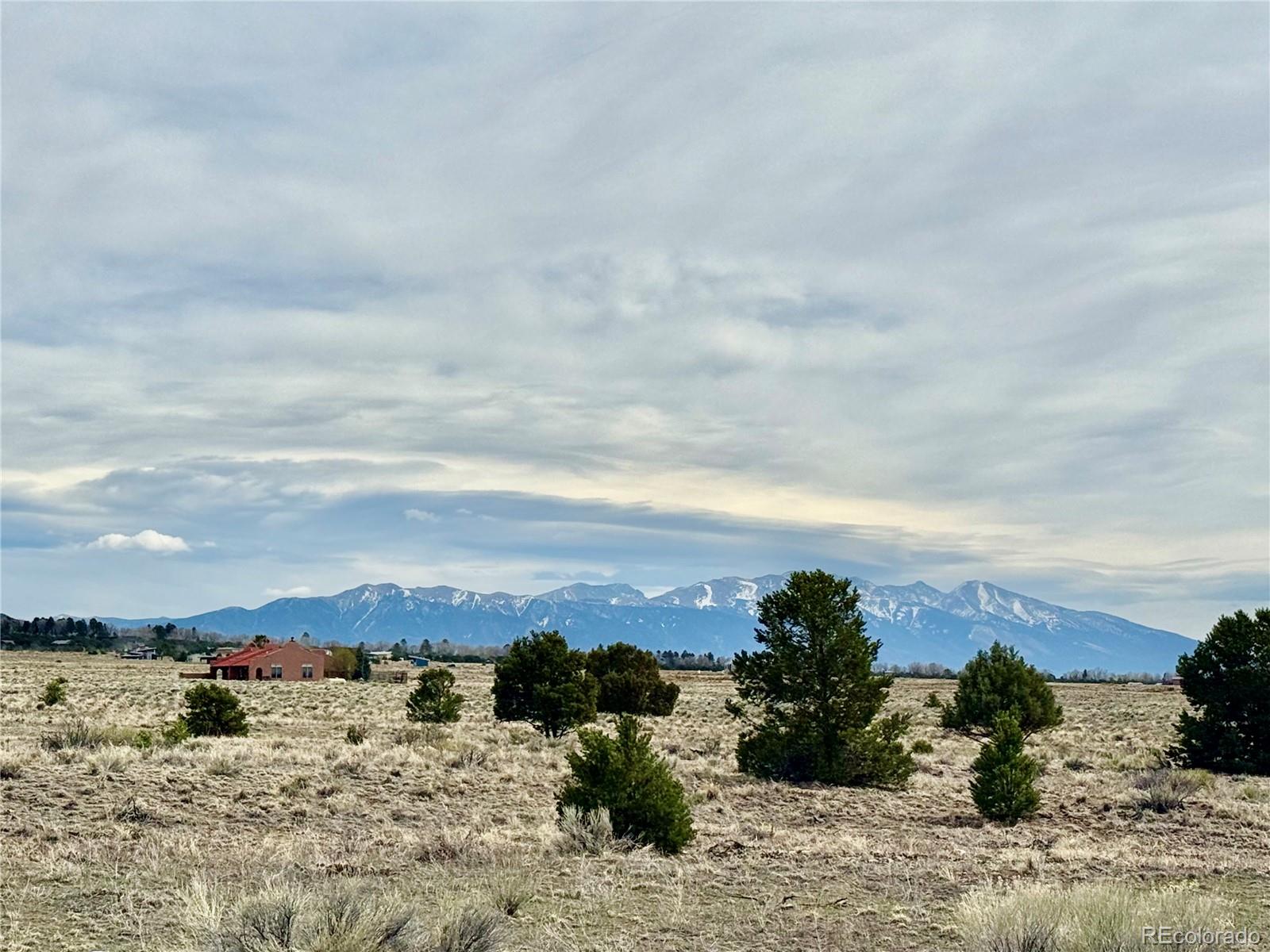 915 Brook Trout Road Crestone, CO 81131 - Photo 4 of 6 a view of a sky from a yard