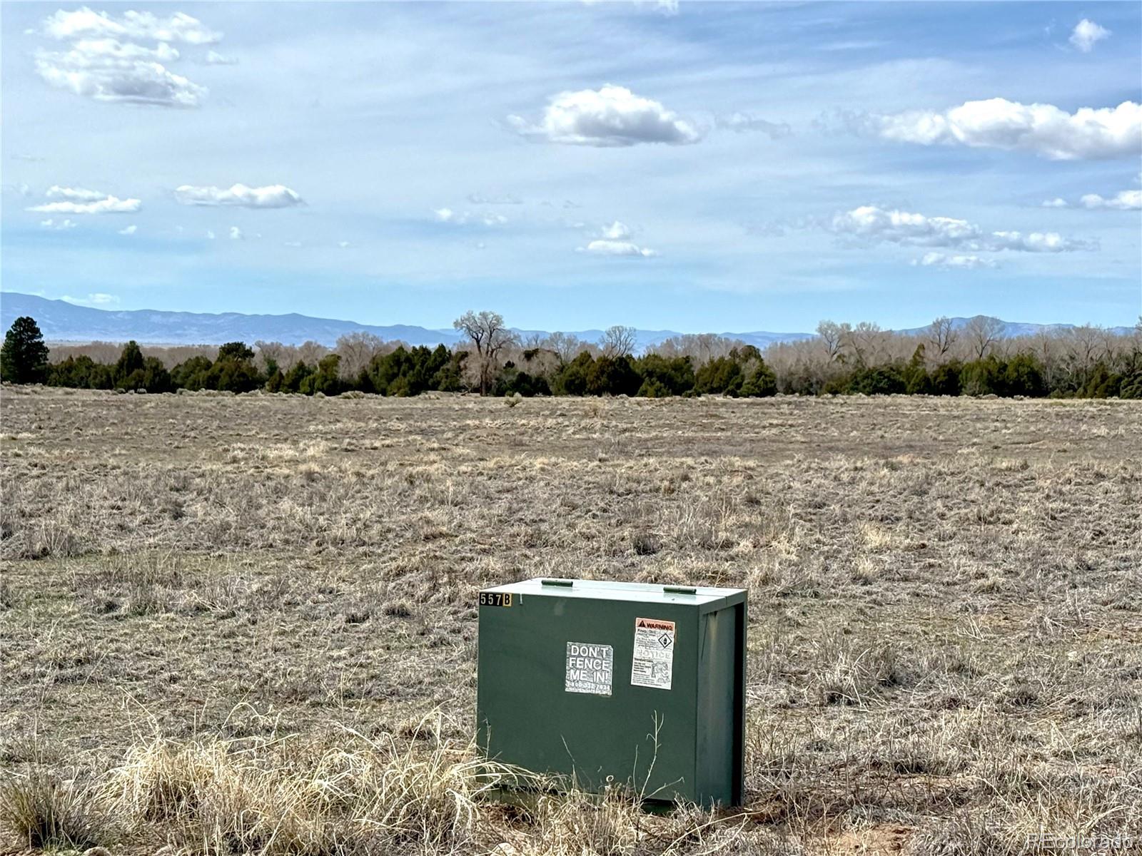 915 Brook Trout Road Crestone, CO 81131 - Photo 5 of 6 a view of lake with mountain