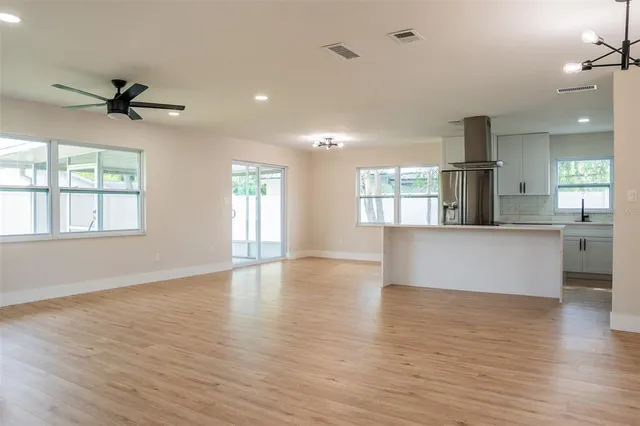 a view of an empty room and window