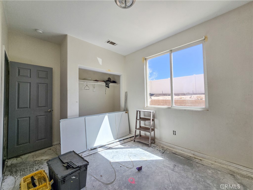 15587 Ripple Ridge Way Victorville, CA 92394 - Photo 15 of 32 downstairs bedroom