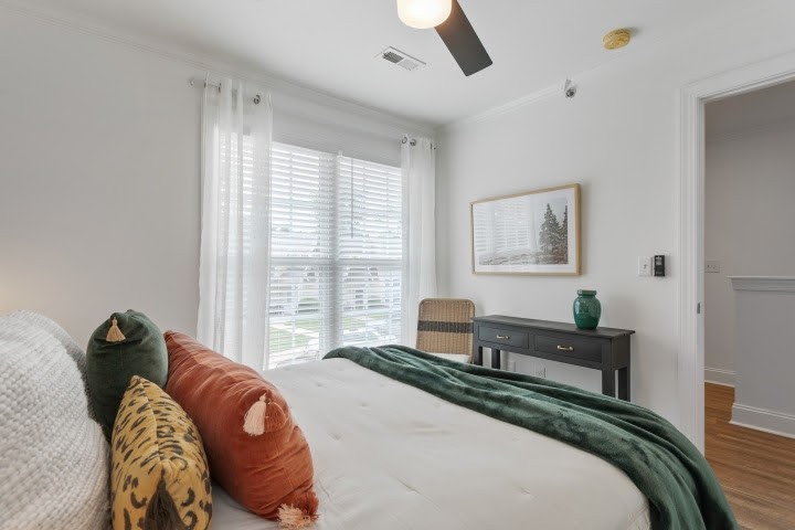 2010 Birch Lane Spring Hill, TN 37174 - Photo 19 of 47 a bedroom with a bed and wooden floor