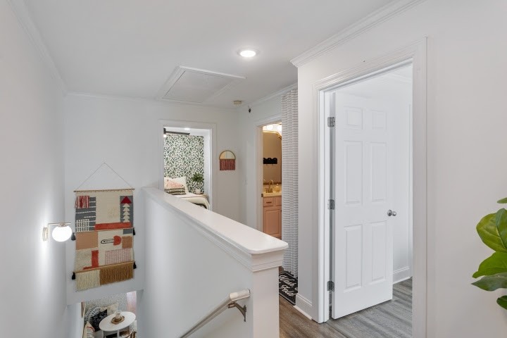 2010 Birch Lane Spring Hill, TN 37174 - Photo 20 of 47 a view of a hallway with bathroom and wooden floor