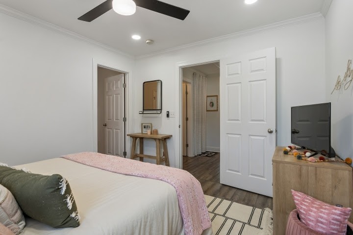 2010 Birch Lane Spring Hill, TN 37174 - Photo 24 of 47 a bedroom with a bed and a flat tv screen on the dresser