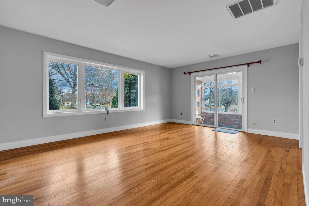1280 School Lane Roebling, NJ 08554 - Photo 22 of 34 a view of an empty room with wooden floor and a window