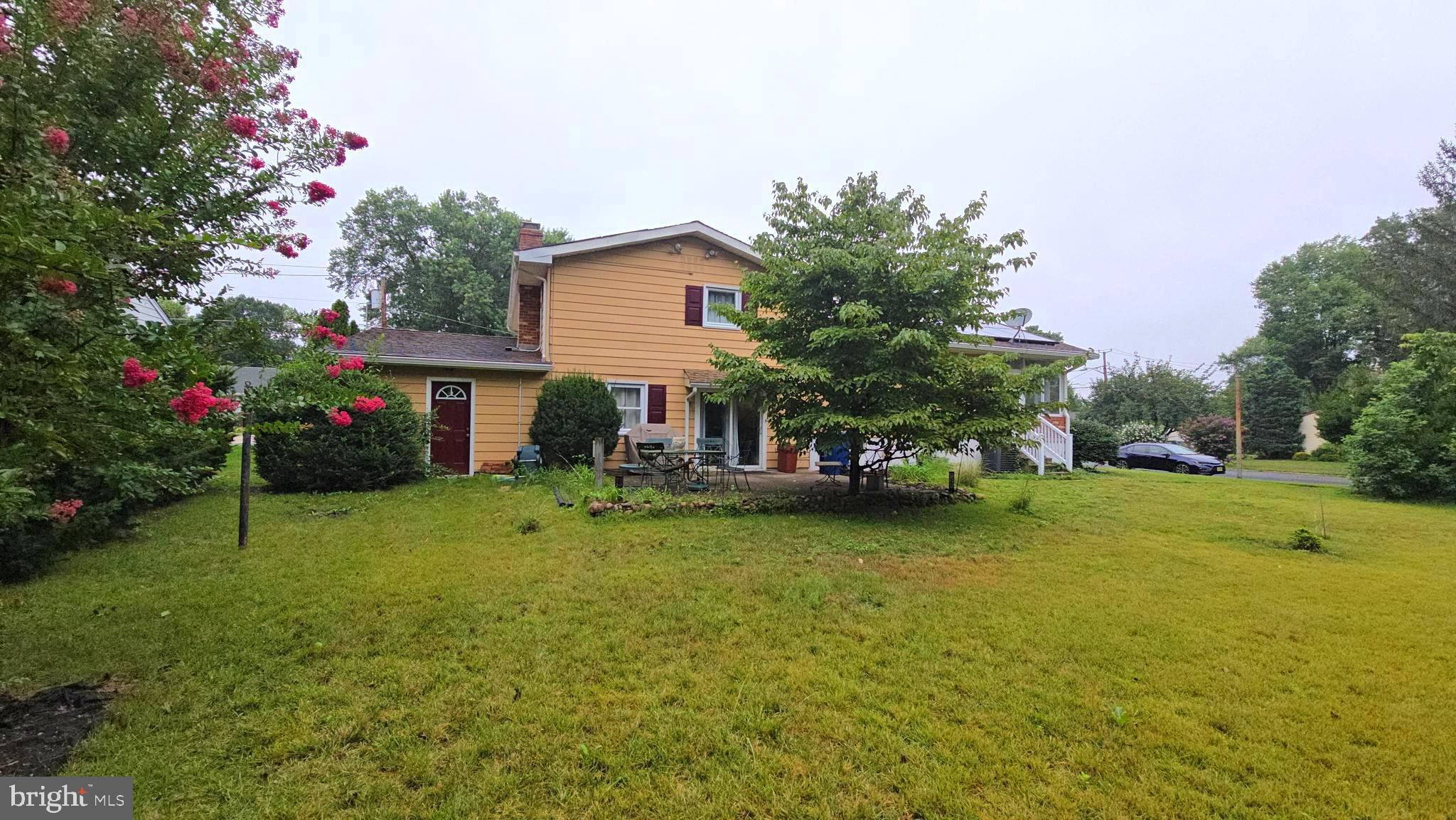1280 School Lane Roebling, NJ 08554 - Photo 4 of 34 a front view of a house with garden