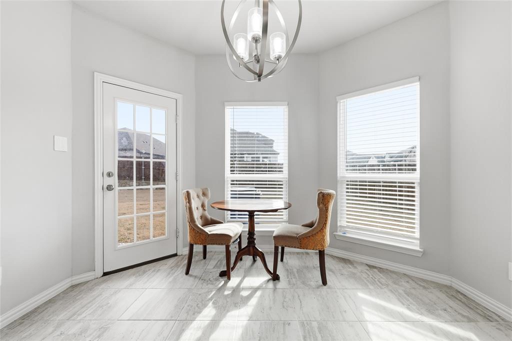 1315 Cascade Lane Forney, TX 75126 - Photo 18 of 36 a view of a room with a large window and furniture