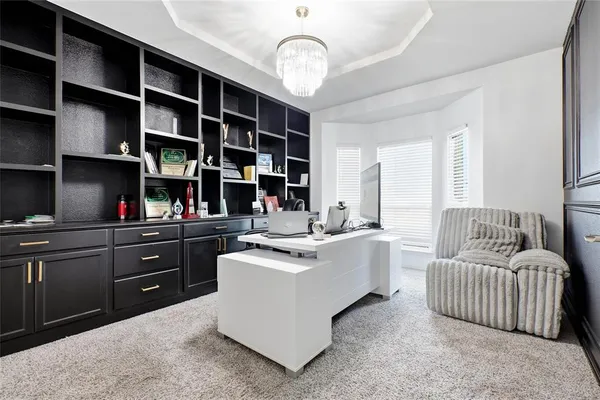 a living room with furniture and decor