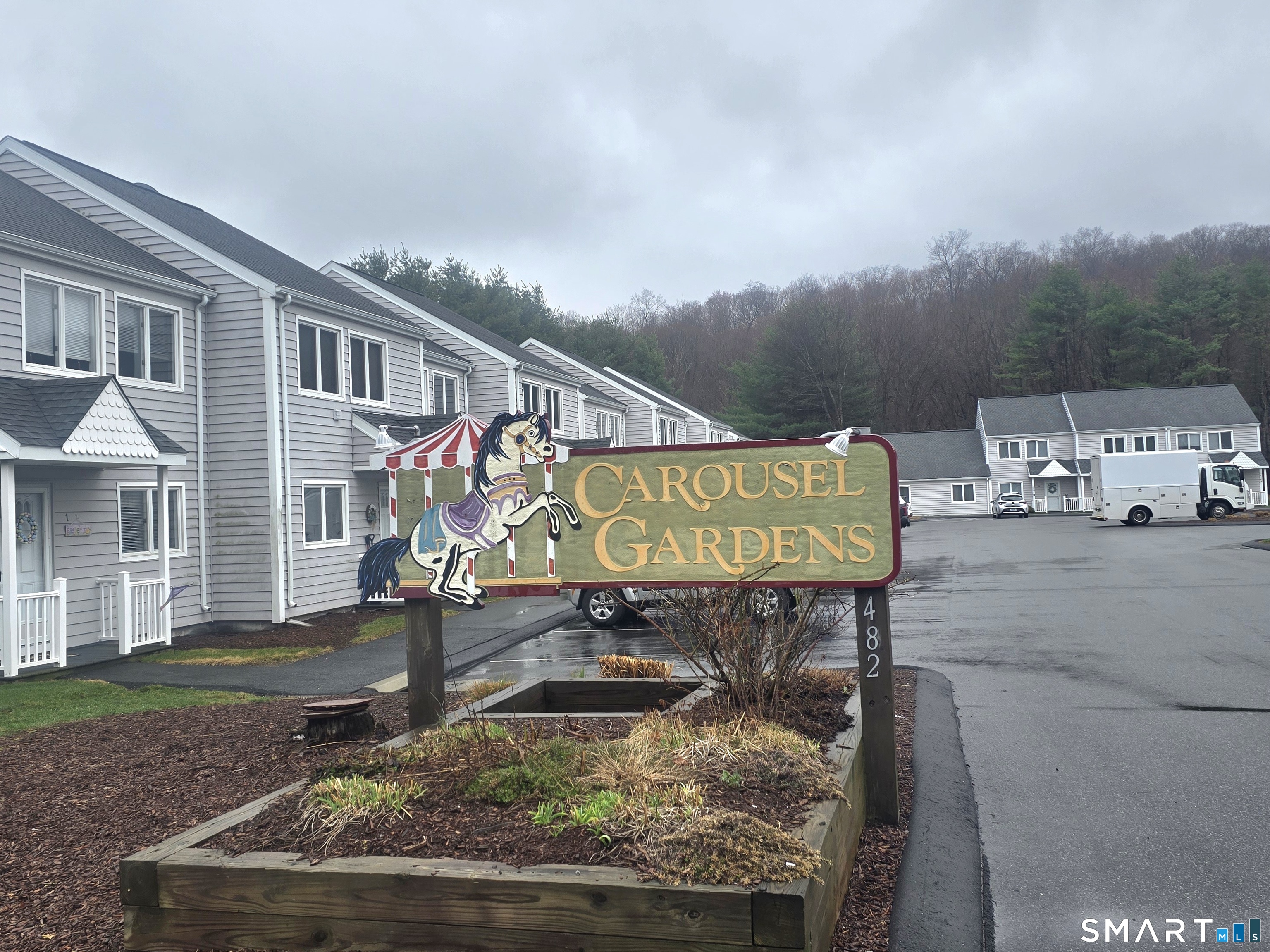 482 Lake Avenue, Unit 4 Bristol, CT 06010 - Photo 12 of 12 a sign that is on the side of a road