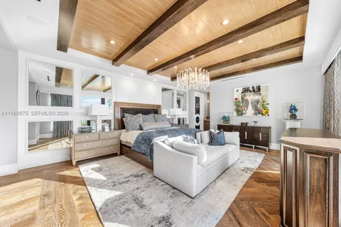 a spacious bathroom with a tub sink and mirror