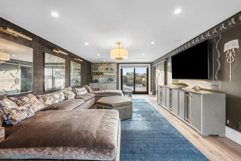 a view of multiple house with swimming pool and sitting area