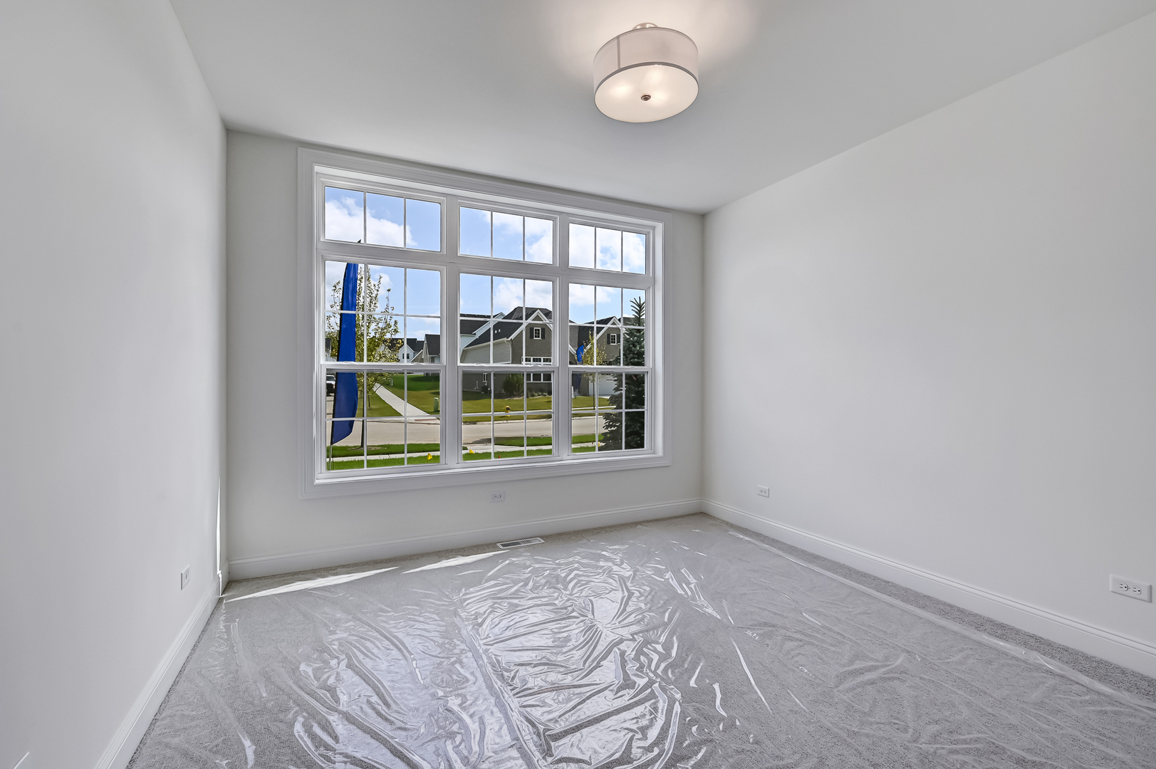 12260 Copper Ridge Drive, Unit 39 Lemont, IL 60439 - Photo 20 of 24 an empty room with a window