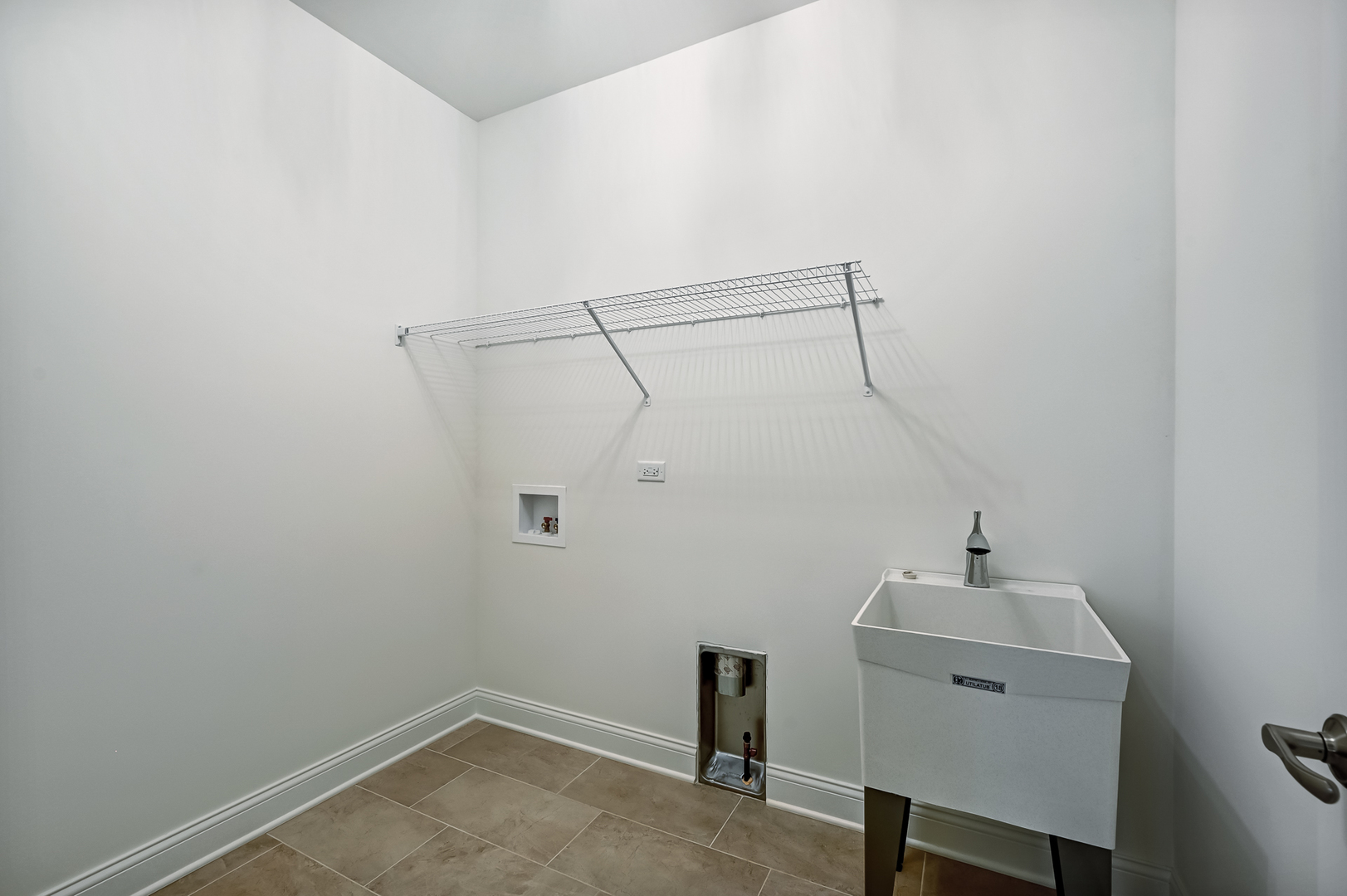 12260 Copper Ridge Drive, Unit 39 Lemont, IL 60439 - Photo 23 of 24 a bathroom with a sink a vanity and a window