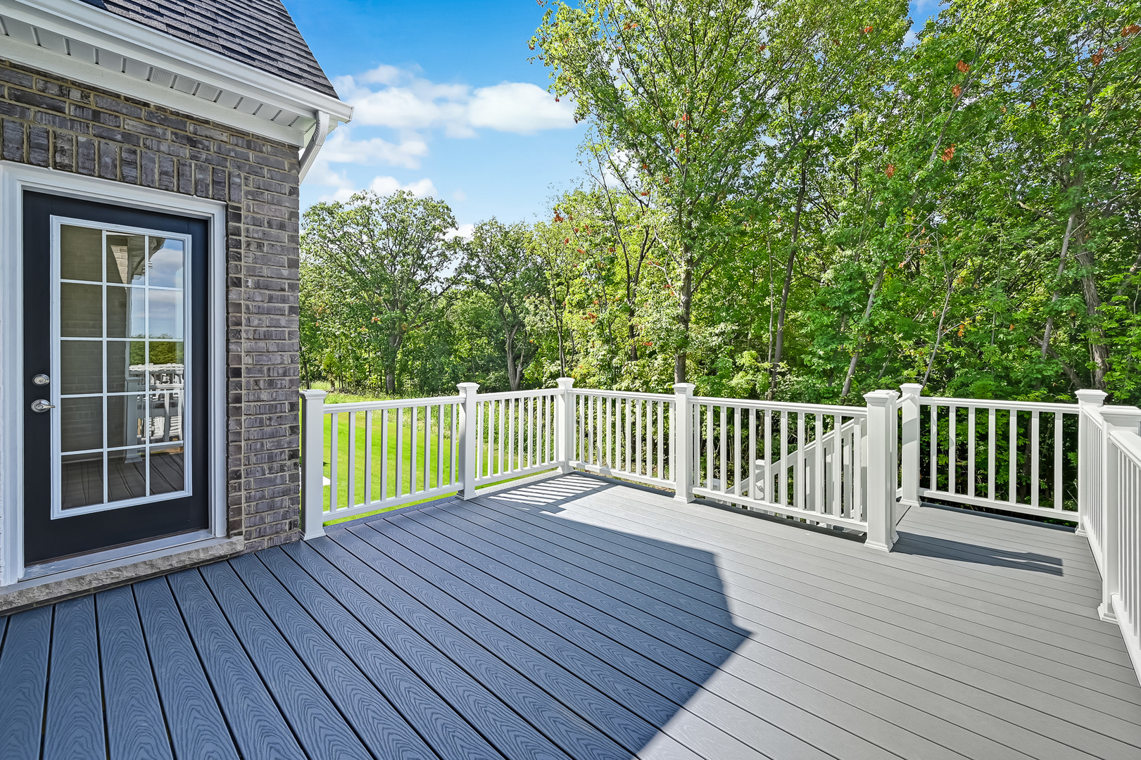12260 Copper Ridge Drive, Unit 39 Lemont, IL 60439 - Photo 5 of 24 a view of a wooden deck