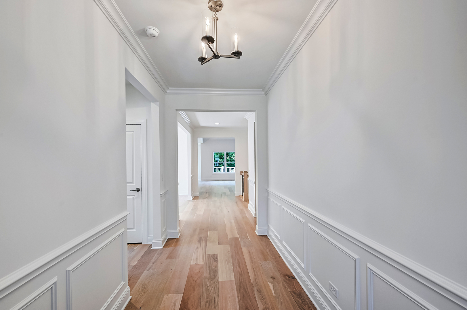 12260 Copper Ridge Drive, Unit 39 Lemont, IL 60439 - Photo 7 of 24 a view of a hallway with wooden floor and staircase