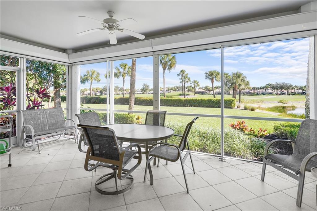 23081 Rosedale Drive, Unit 101 Estero, FL 34135 - Photo 33 of 41 Sunroom / solarium featuring golf course view and tile patterned floors