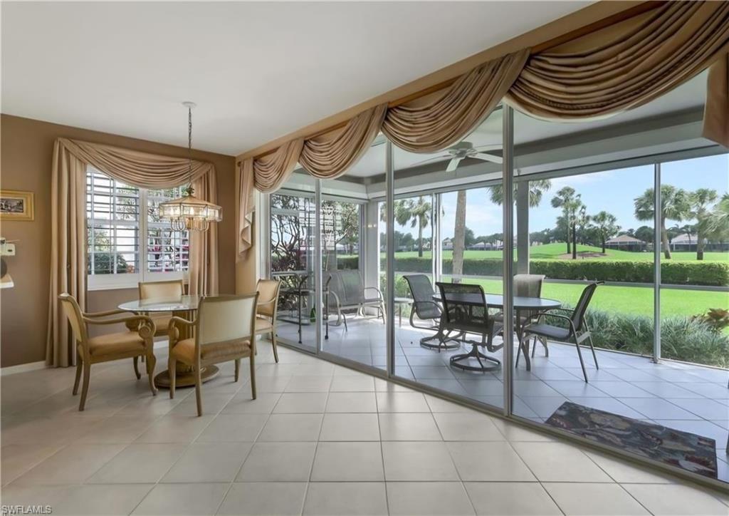 23081 Rosedale Drive, Unit 101 Estero, FL 34135 - Photo 6 of 38 a outdoor space with lots of tables and chairs