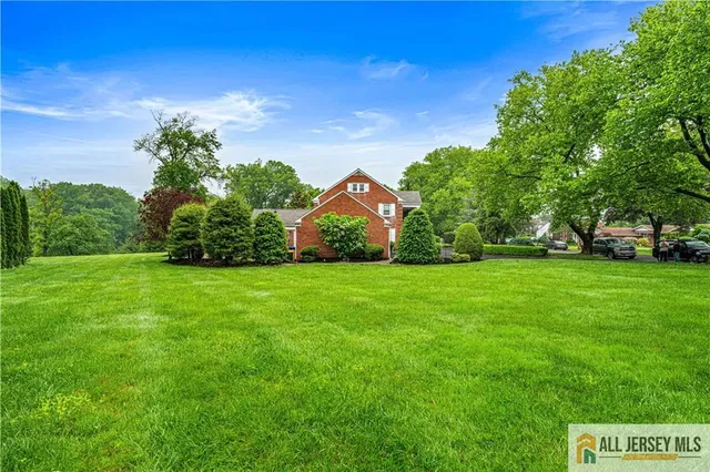 a view of a garden with houses