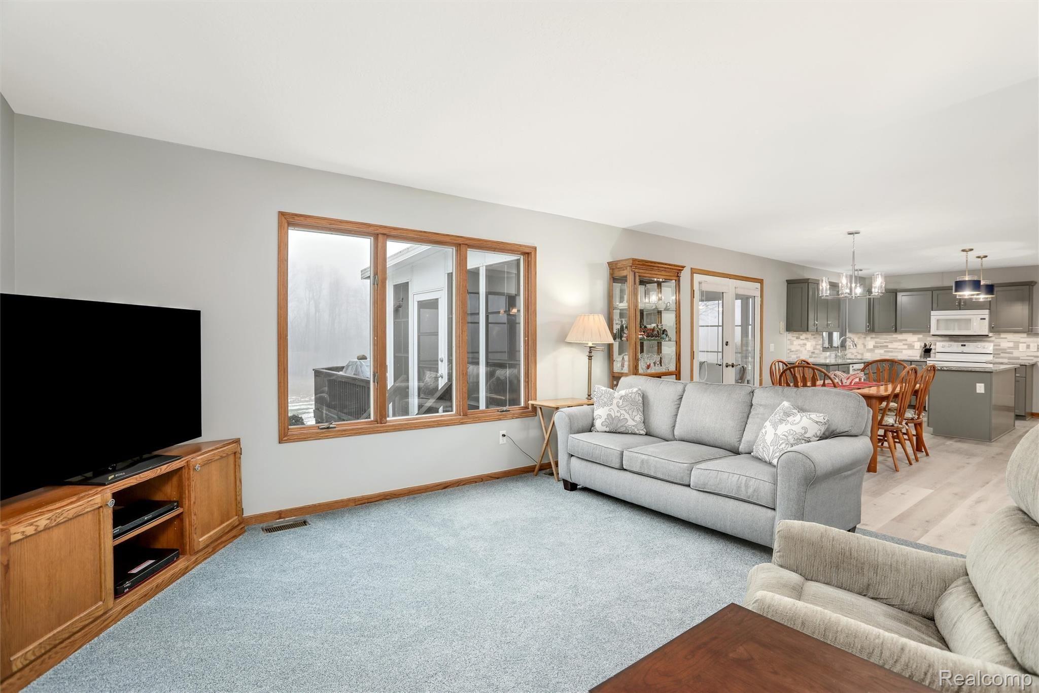 2755 County Farm Road Howell, MI 48843 - Photo 11 of 39 Family room open to kitchen