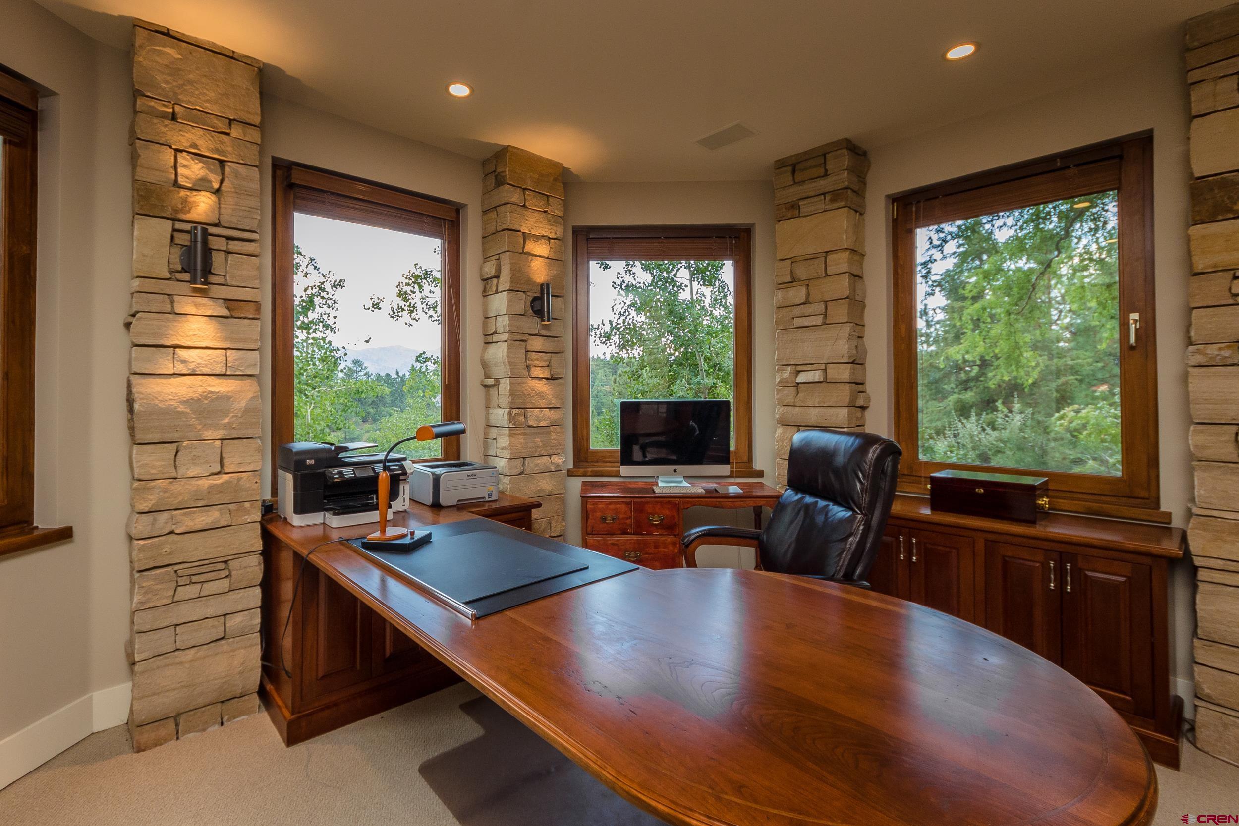 9475 High Meadows Durango, CO 81301 - Photo 26 of 35 a view of a workspace with furniture and a window