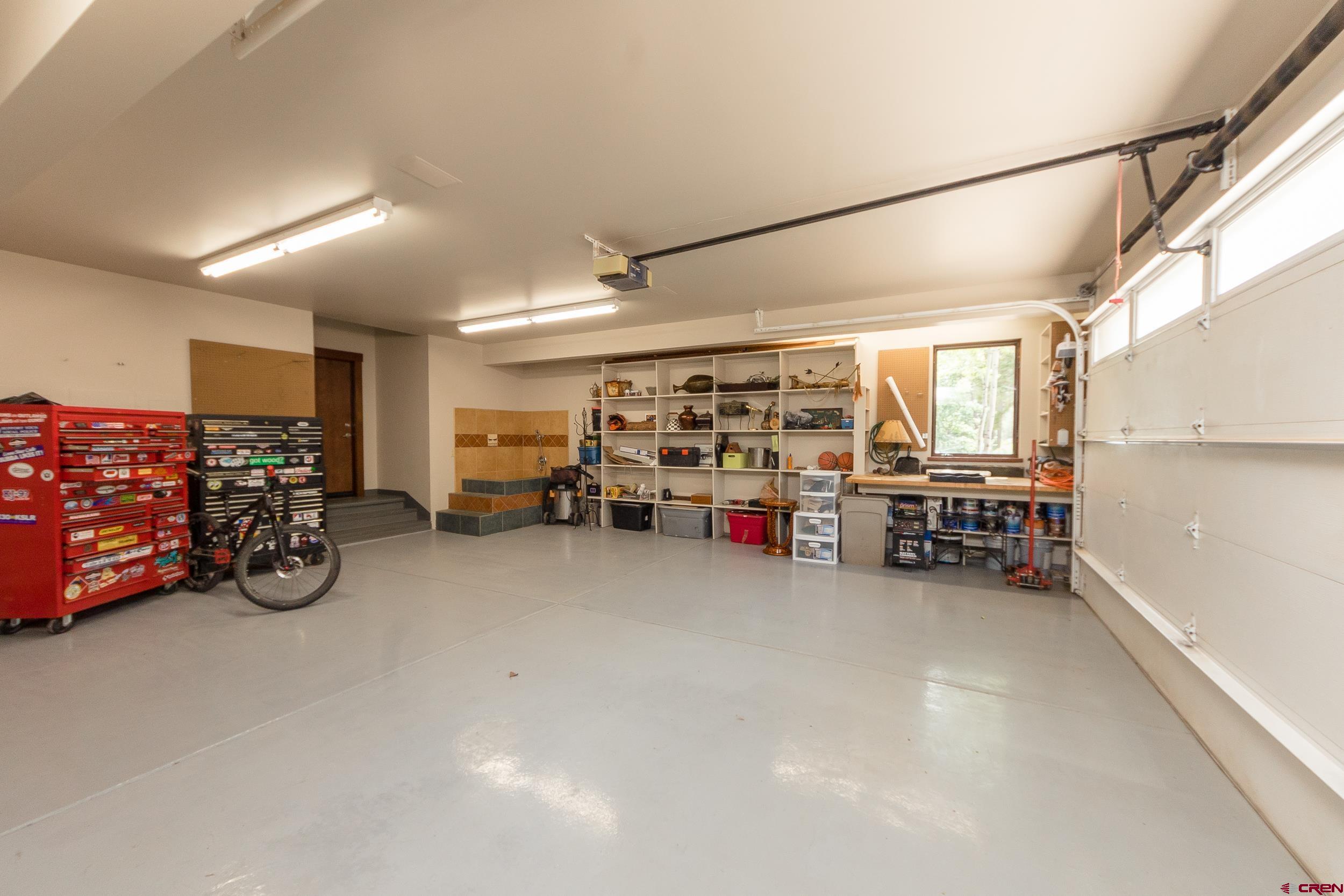 9475 High Meadows Durango, CO 81301 - Photo 31 of 35 a view of a storage in a room with furniture and a garage
