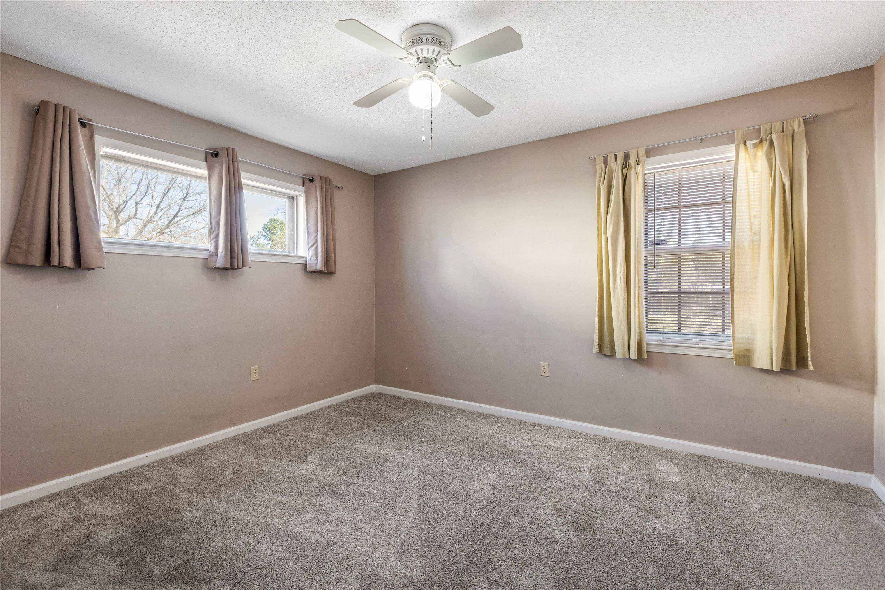 3876 Luther Road Bartlett, TN 38135 - Photo 11 of 20 a view of an empty room with a window