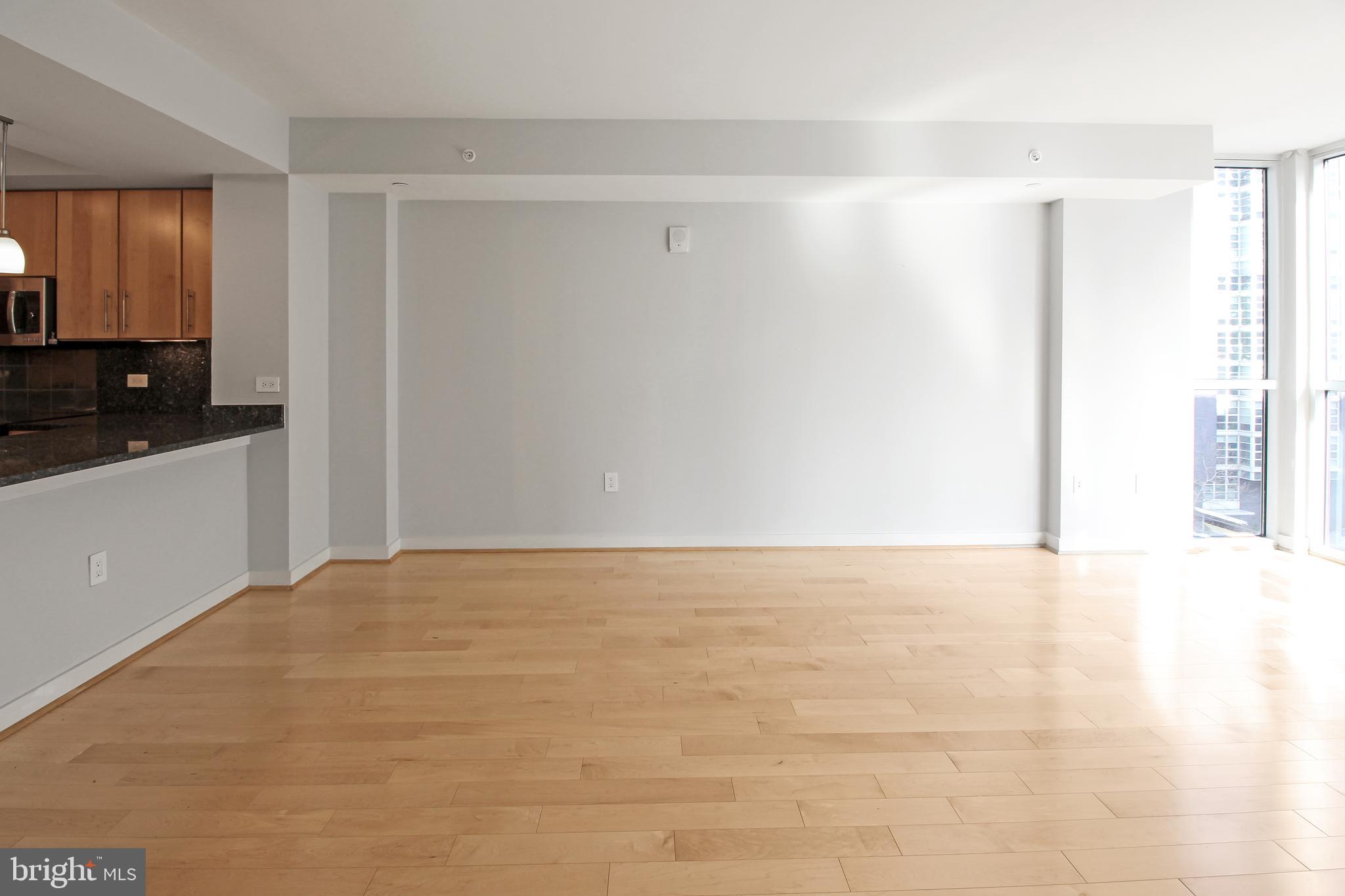 1025 First Street Southeast, Unit 612 Washington, DC 20003 - Photo 11 of 41 a view of an empty room with a window