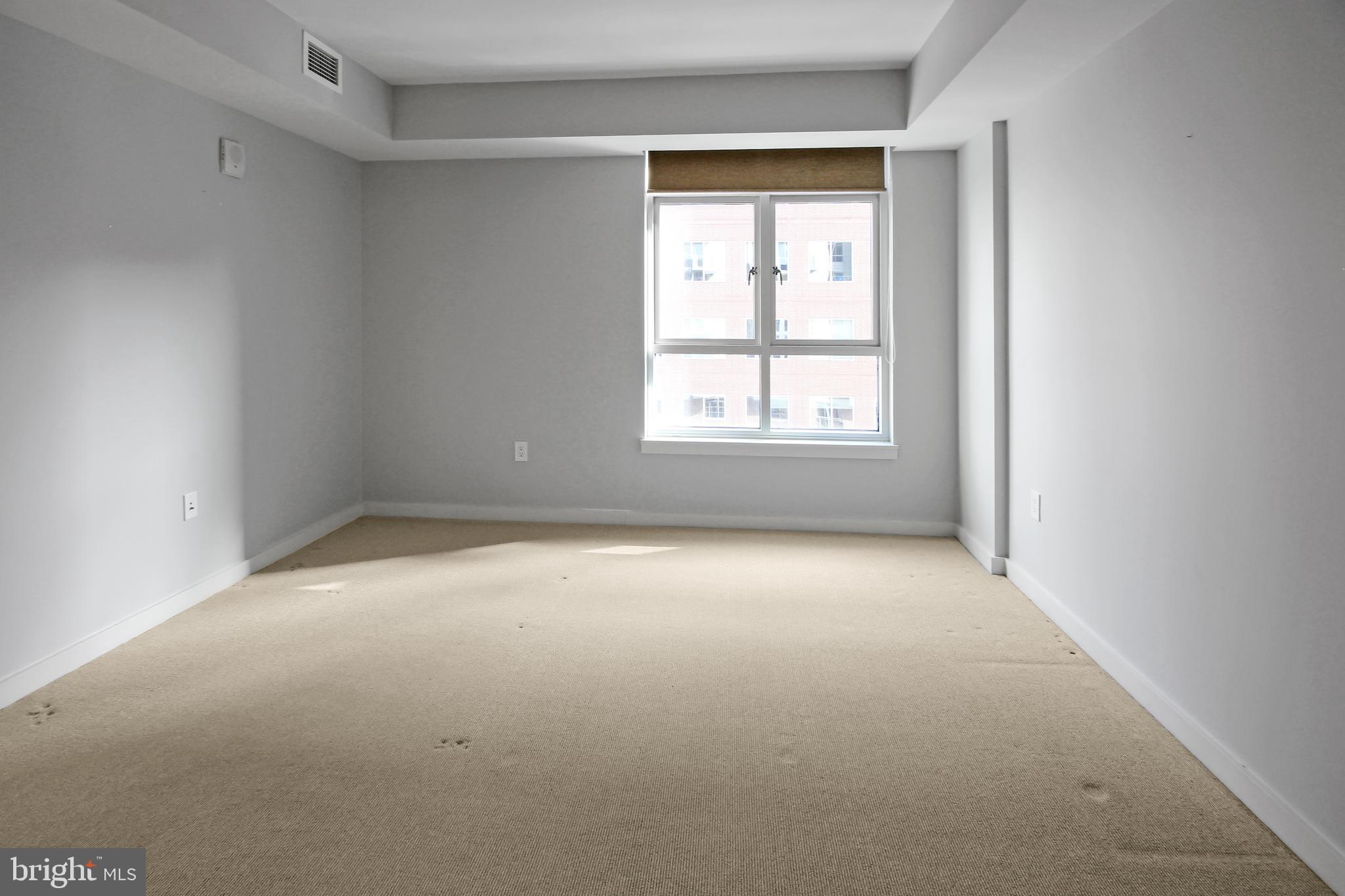 1025 First Street Southeast, Unit 612 Washington, DC 20003 - Photo 12 of 41 an empty room with a window