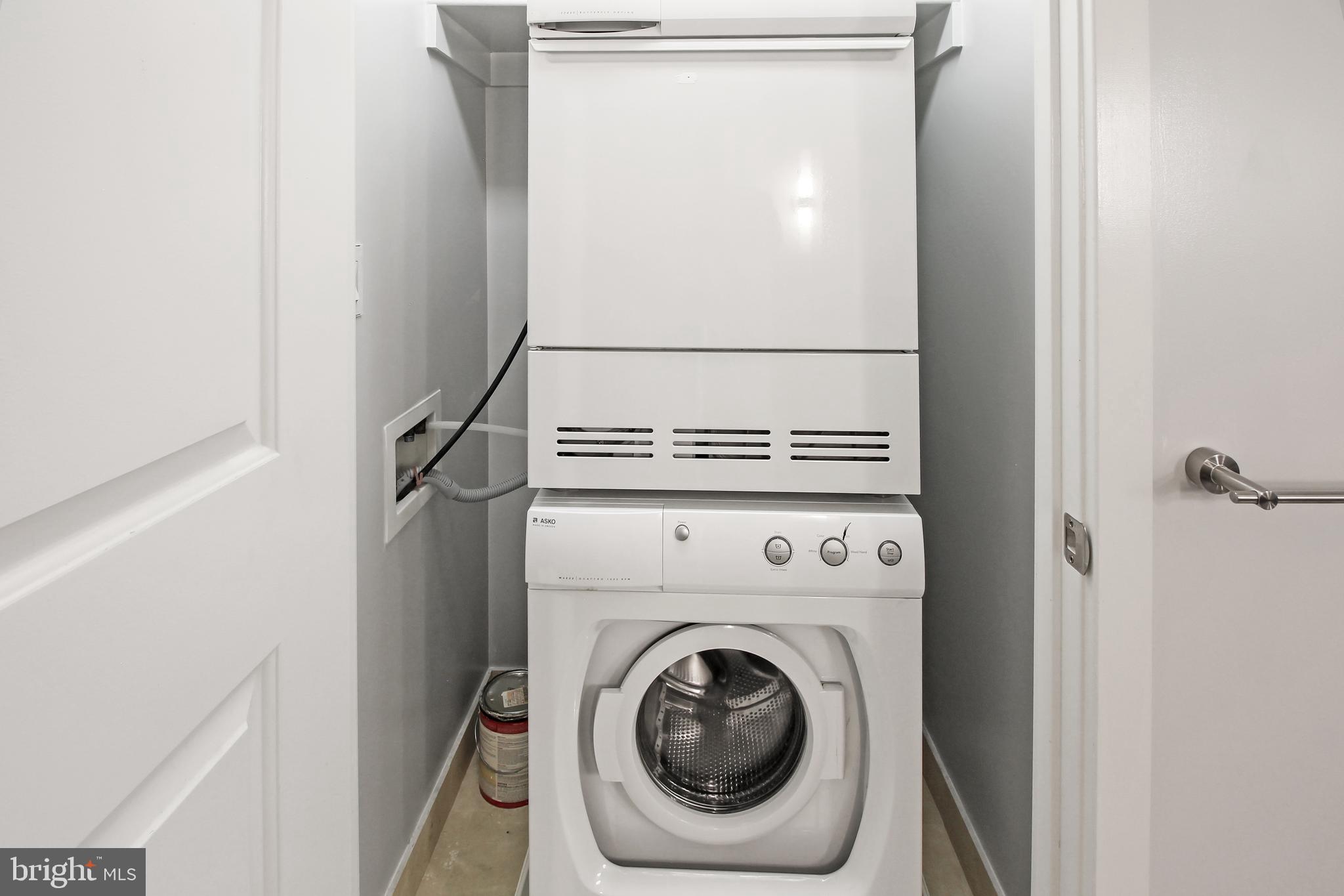 1025 First Street Southeast, Unit 612 Washington, DC 20003 - Photo 21 of 41 a utility room with dryer and washer