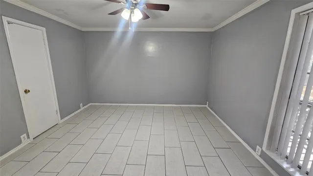 a kitchen with granite countertop a sink and cabinets