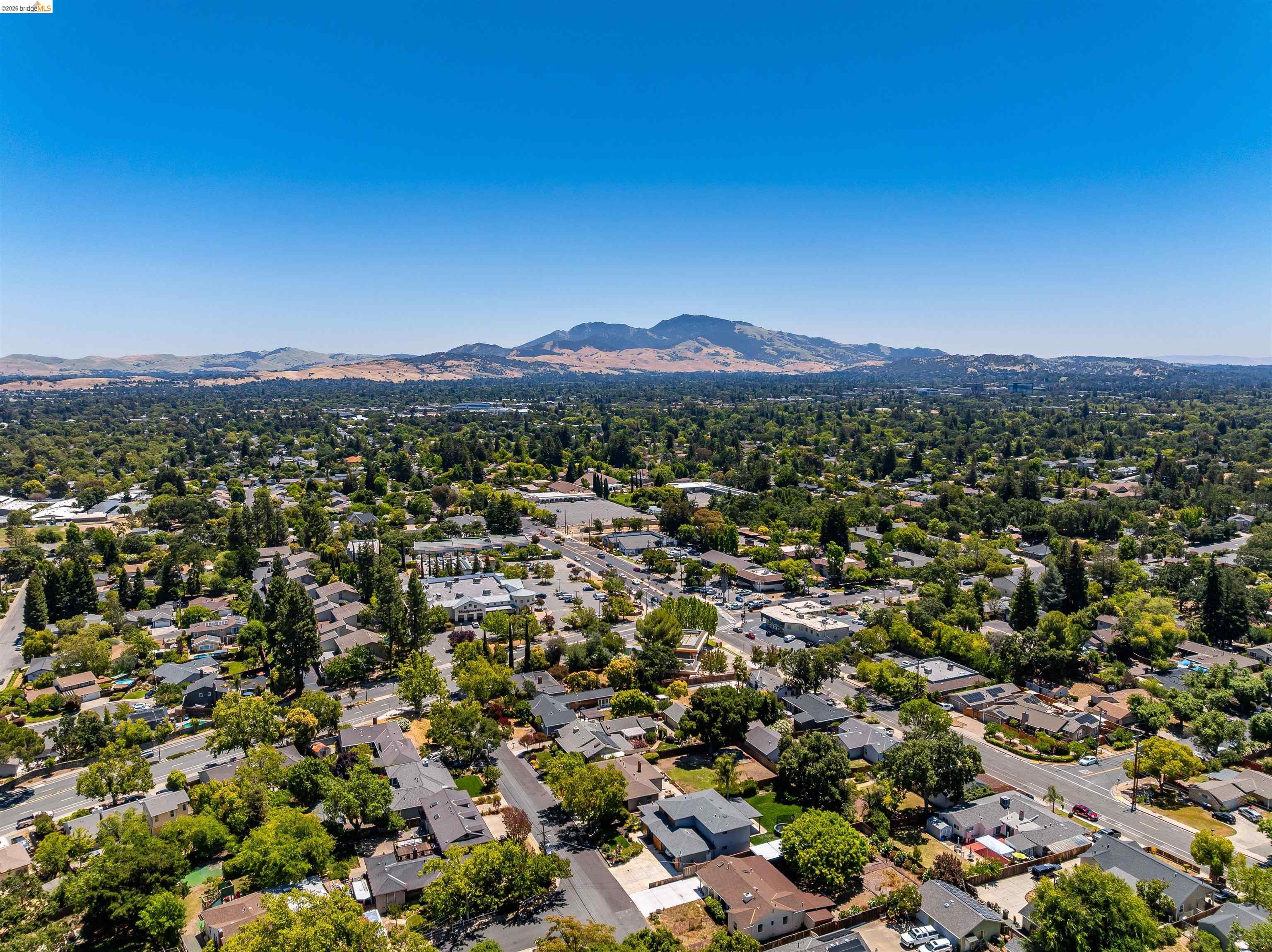 346 Valley View Road Pleasant Hill, CA 94523 - Photo 54 of 57 Expansive aerial capturing a residential landscape with a mountainous backdrop